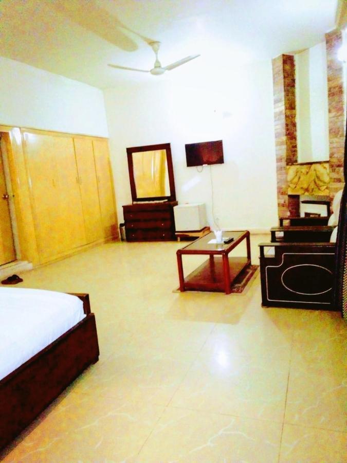 Pyramid International Guest House Ісламабад Номер фото